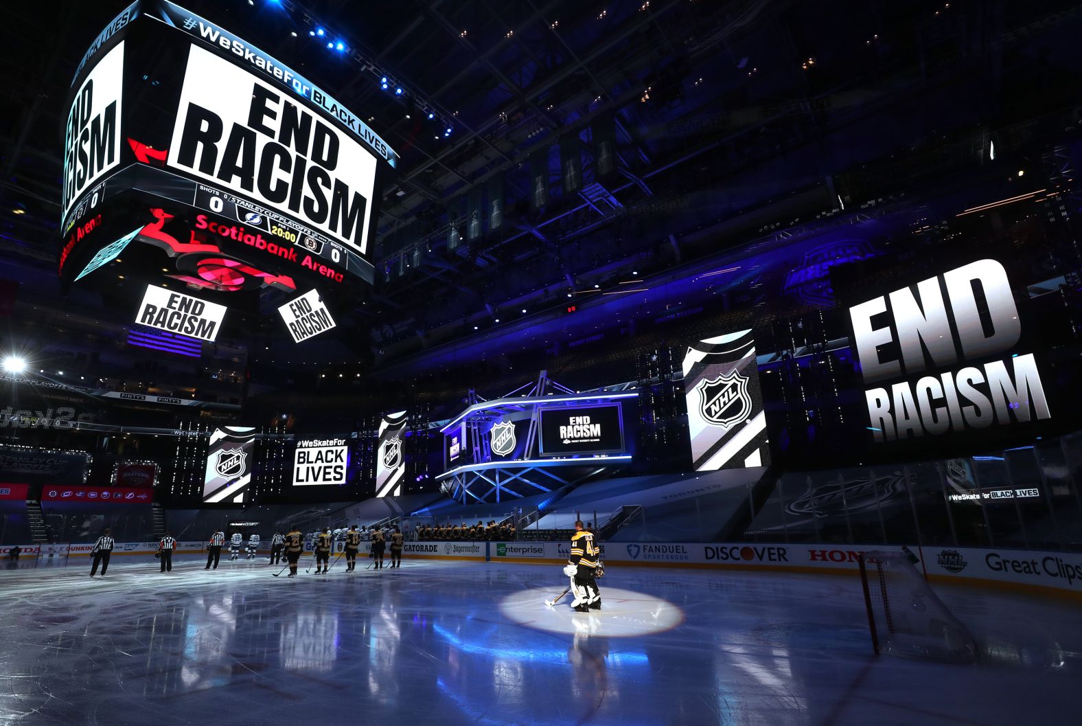 "End racism" banners are shown in Toronto's Scotiabank Arena before an NHL playoff game on August 26.