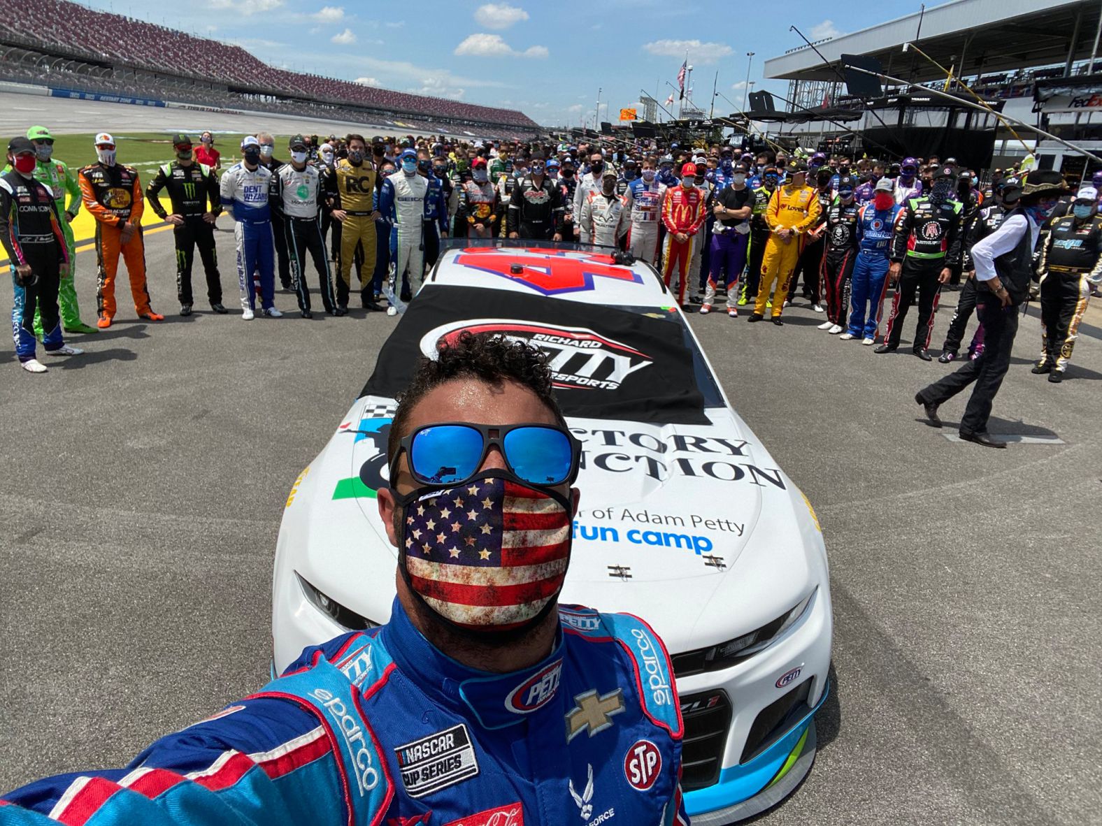 NASCAR driver Bubba Wallace <a href="index.php?page=&url=https%3A%2F%2Ftwitter.com%2FBubbaWallace%2Fstatus%2F1275141190824996864" target="_blank" target="_blank">tweeted this selfie</a> before a Cup Series race in Talladega, Alabama, on June 22. Fellow drivers and pit crew members <a href="index.php?page=&url=https%3A%2F%2Fwww.cnn.com%2F2020%2F06%2F22%2Fus%2Fnascar-race-bubba-wallace-talladega%2Findex.html" target="_blank">walked alongside Wallace's car</a> to show their support for him. Wallace, the only Black driver in NASCAR's top circuit, has been an outspoken advocate of the Black Lives Matter movement. 