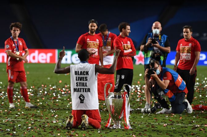 After winning the Champions League, Bayern Munich defender David Alaba wears a shirt that says "Black Lives Still Matter."