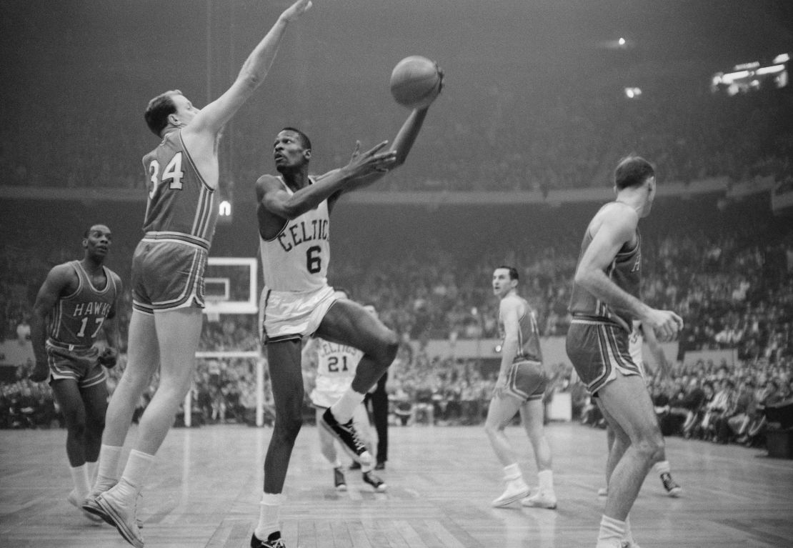 Boston Celtics player Bill Russell during a 1960 NBA Championship game against the Saint Louis Hawks.