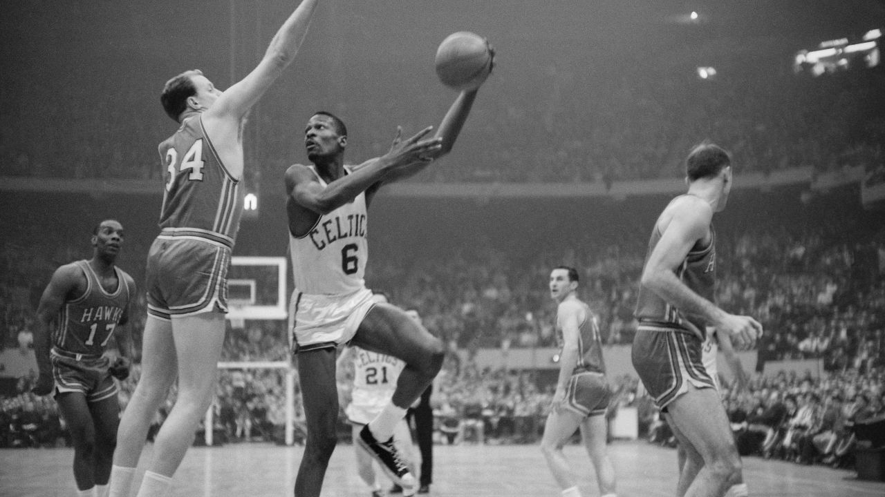 Boston Celtics player Bill Russell during a 1960 NBA Championship game against the Saint Louis Hawks.