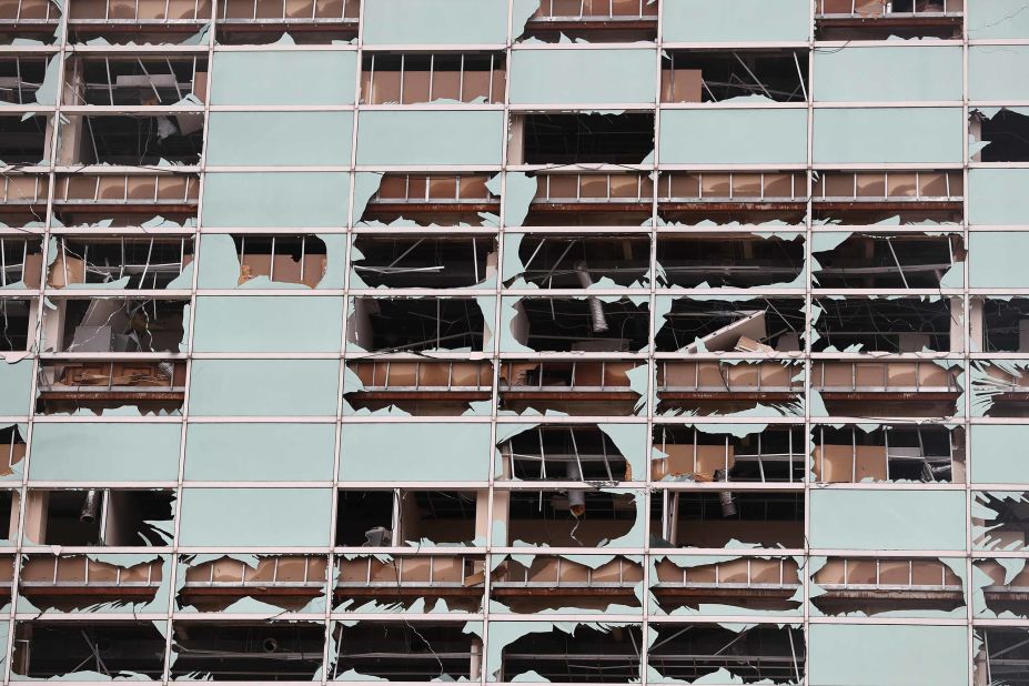 The Capitol One Bank Tower is seen with its windows blown out in downtown Lake Charles.