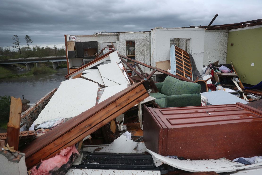A Lake Charles hotel room sits exposed to the elements on Thursday after its roof was torn off.