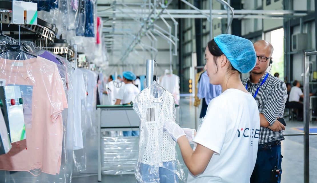 A scene from YCloset's facility where luxury items are cleaned and prepared for rental.