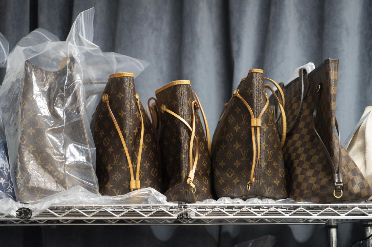 Louis Vuitton luxury bags sit on shelves in the live-streaming room at Ponhu Luxury, one of a growing number of second-hand luxury goods platforms in China.