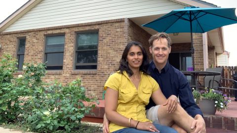 Aterah Nusrat and Morgan Dix left Boston during the pandemic. Here they are in front of their new home in Longmont, Colorado. 