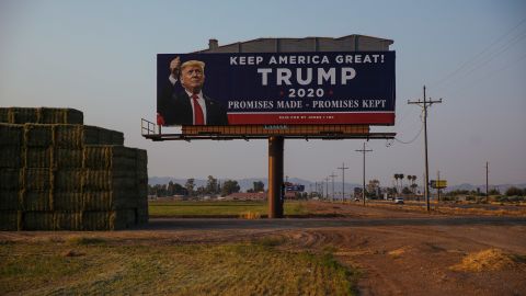 Trump billboards along a desert stretch of highway near the border of California and Arizona were paid for by a small business that received a federal loan.
