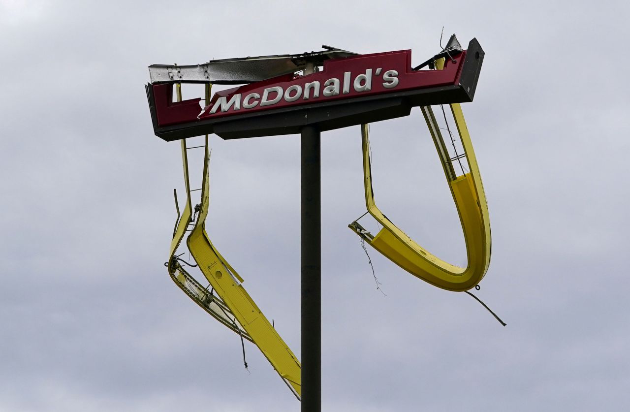 A McDonald's sign is damaged in Iowa, Louisiana, on August 27.