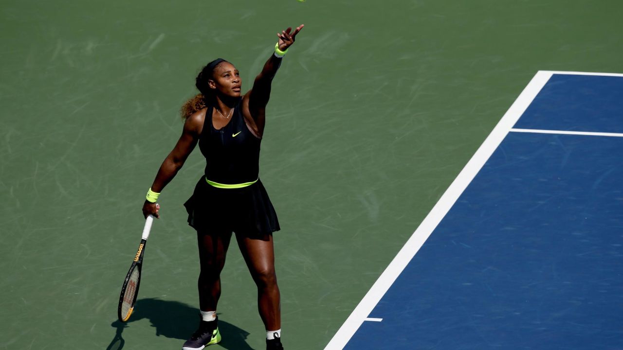 Serena Williams serves to Arantxa Rus of Netherlands during the Western & Southern Open at the USTA Billie Jean King National Tennis Center on August 24, 2020 in the Queens borough of New York City.