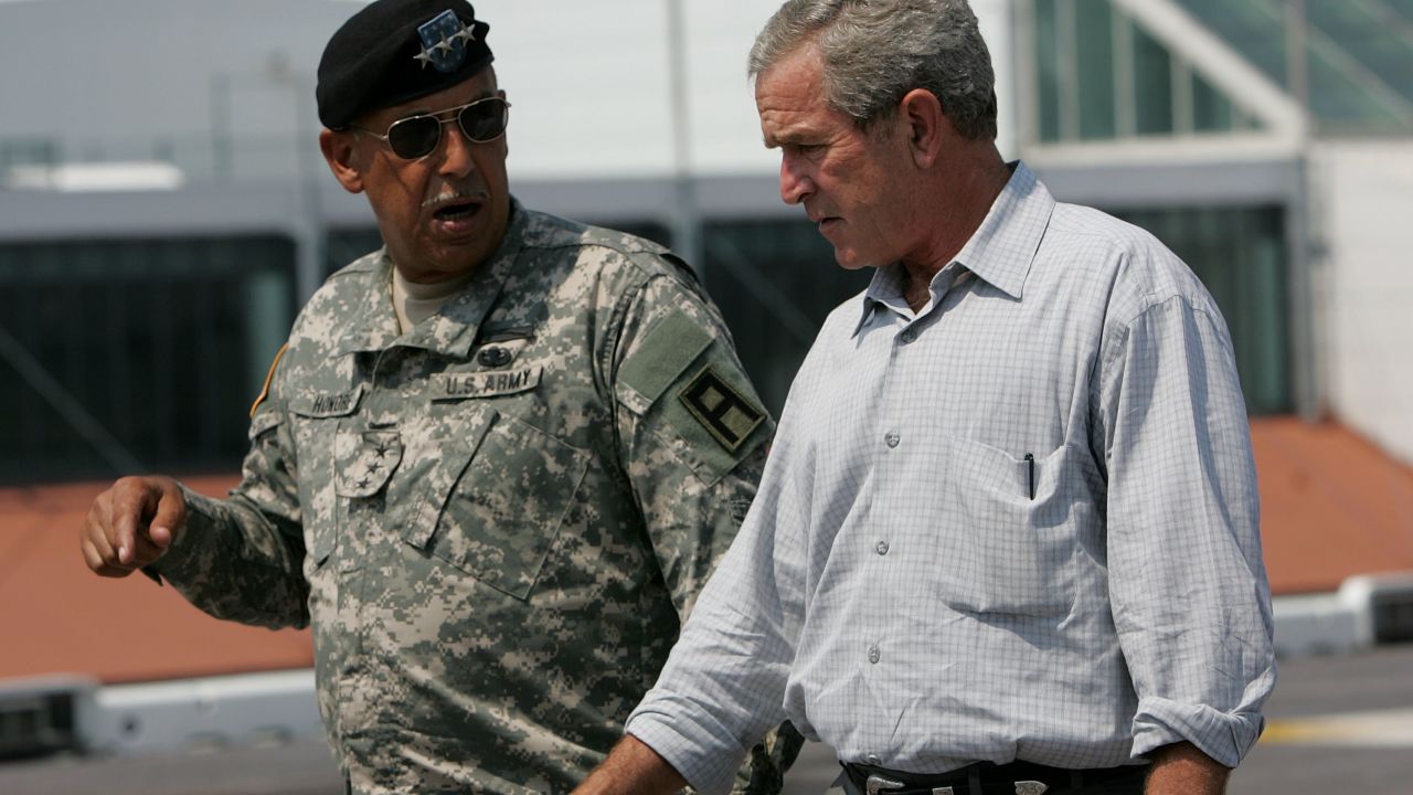 Lt. Gen. Russel Honoré talks with then-President George W. Bush in New Orleans, three weeks after Hurricane Katrina, as Hurricane Rita was threatening the same area.