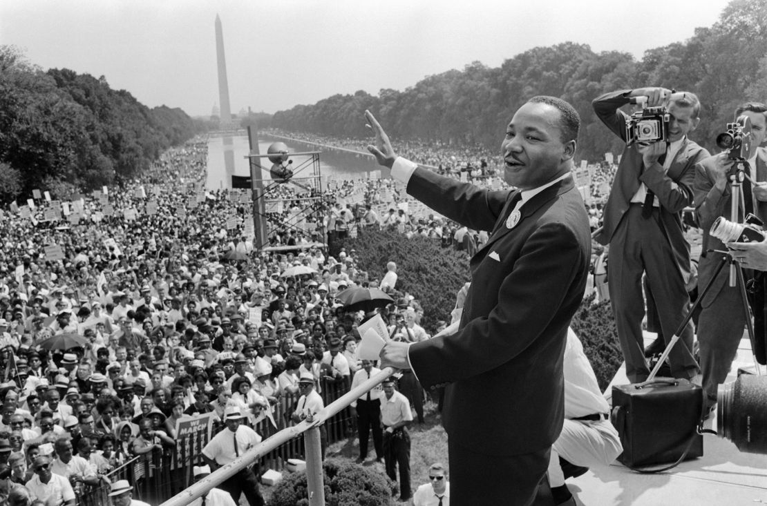 Martin Luther King waves to supporters during the 1963 March on Washington.