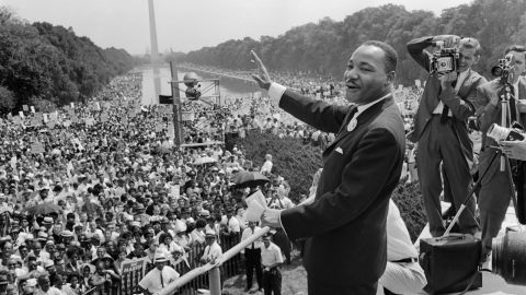 Martin Luther King waves to supporters during the 1963 March on Washington.