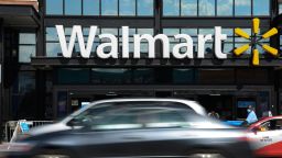 Cars drive past a Walmart store in Washington, DC, on August 18, 2020. - Walmart saw its profits jump in latest quarter as e-commerce sales surged during the coronavirus pandemic and US government stimulus payments boosted spending, the company reported on August 18. (Photo by NICHOLAS KAMM / AFP) (Photo by NICHOLAS KAMM/AFP via Getty Images)