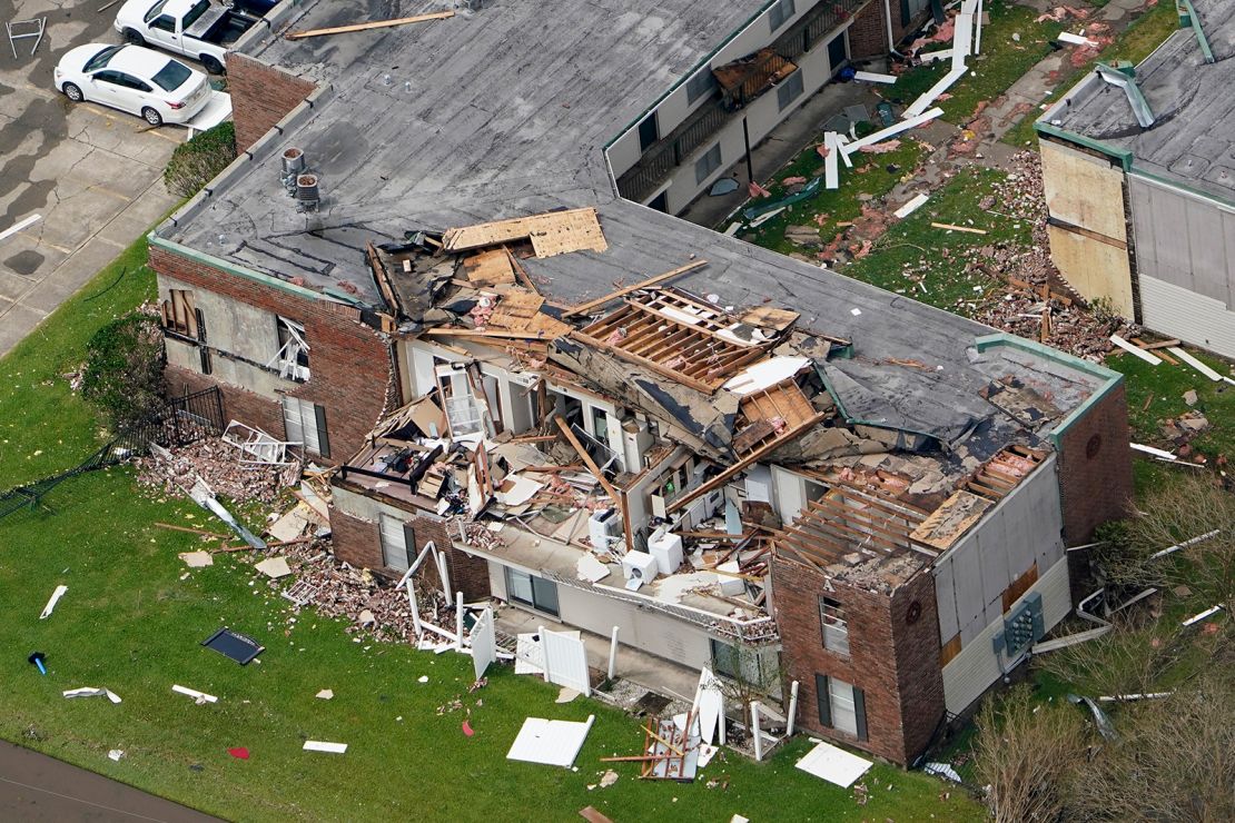 An apartment building is damaged Thursday after Hurricane Laura went through the area near Lake Charles.