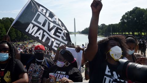 Demonstrators gather outside the Lincoln Memorial for Friday's march.