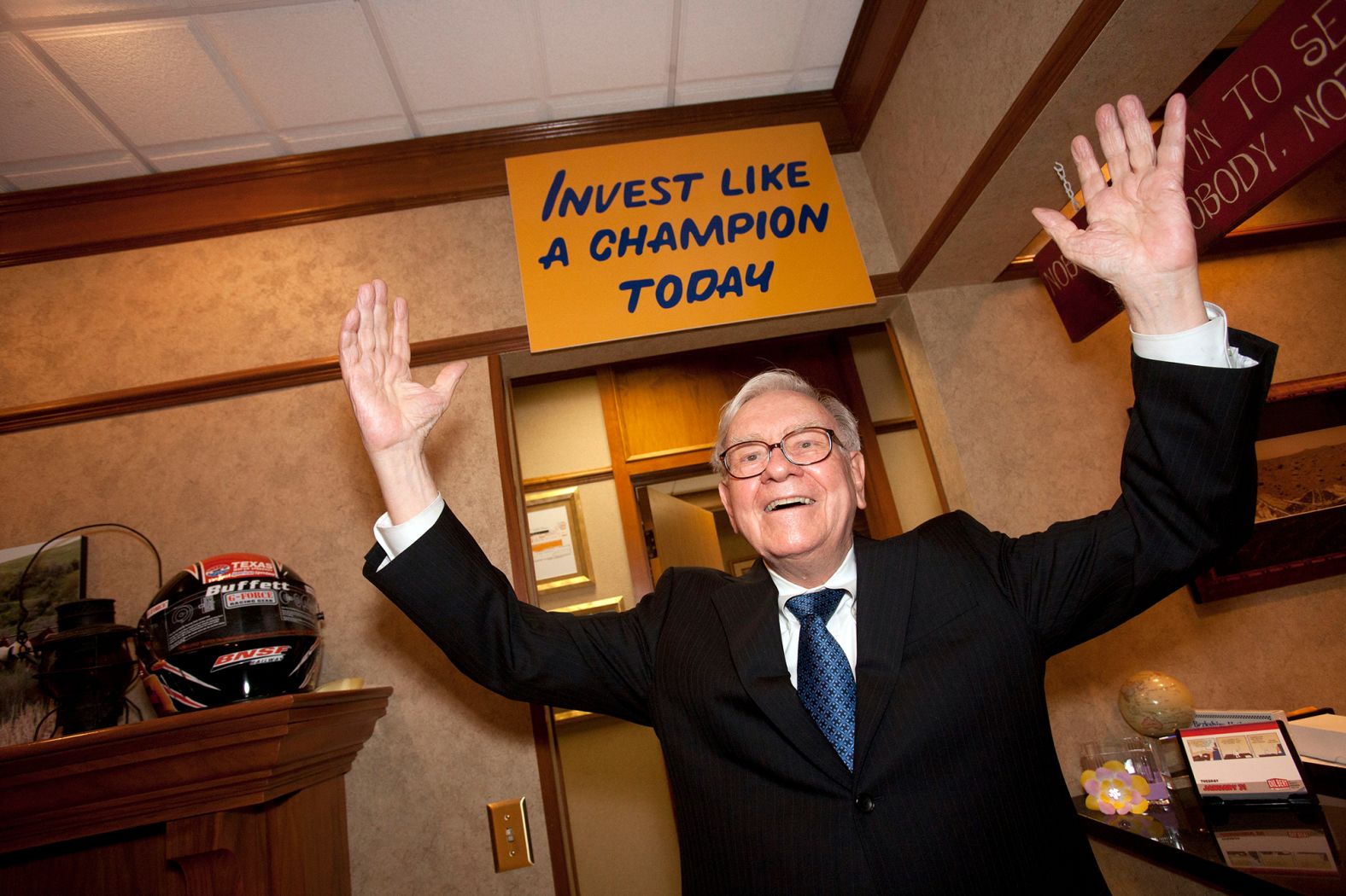 Buffett poses for a photo in Omaha in 2012.