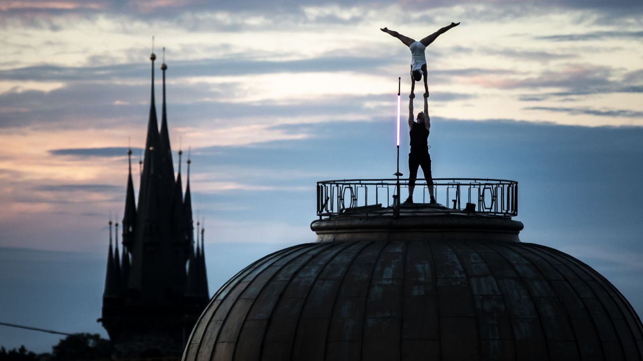 <strong>Prague, Czech Republic:</strong> On an evening in late August, an acrobatic performance of Hans Christian Andersen's "The Shepherdess and the Chimney Sweep" takes place on the rooftop of the Lucerna Palace. 