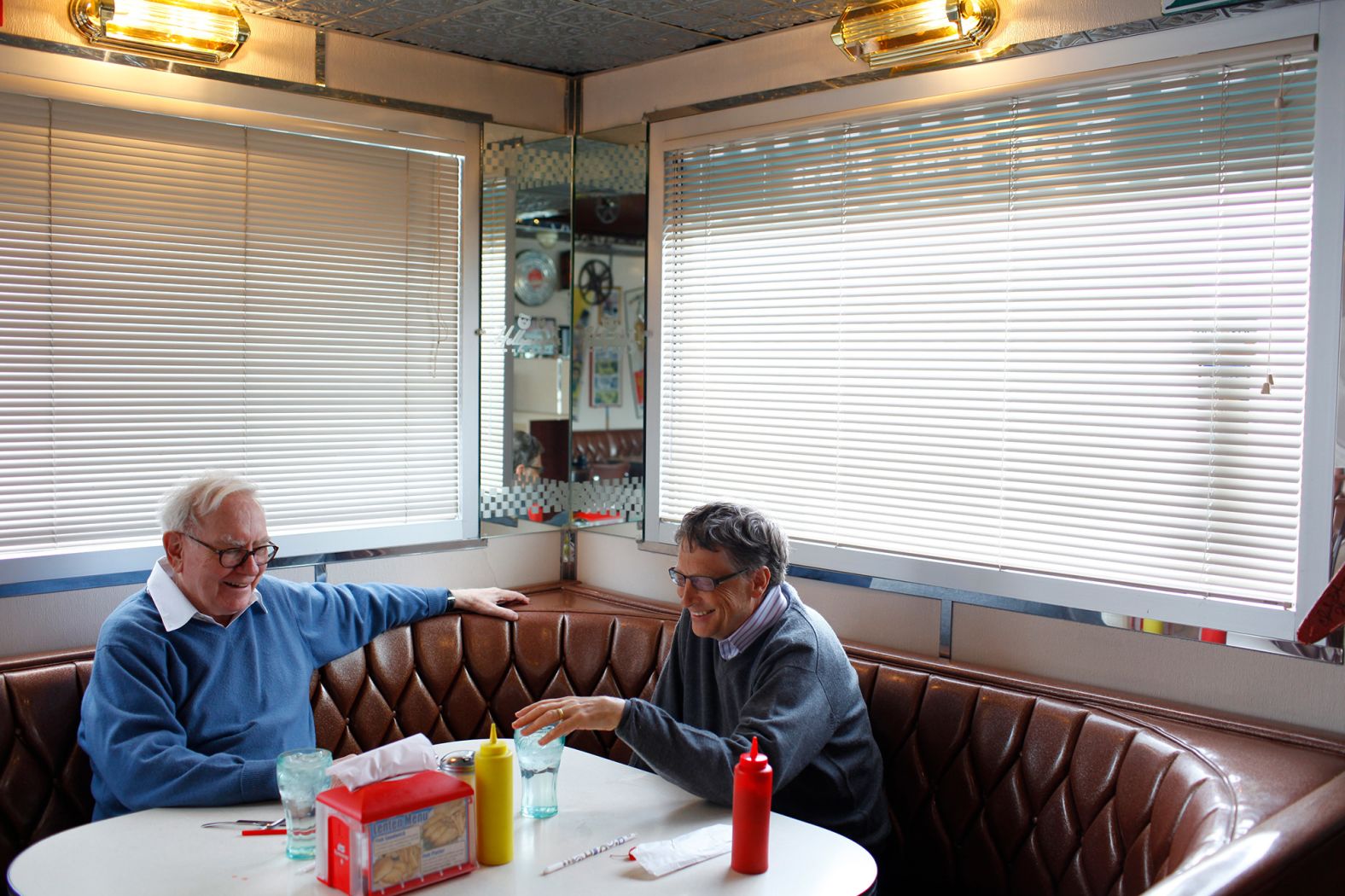 Buffett and Microsoft Chairman Bill Gates enjoy a meal together at the Hollywood Diner in Omaha in 2010. That year, the two launched The Giving Pledge, which encourages the world's billionaires to dedicate the majority of their wealth to philanthropic causes.