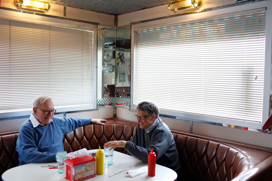 Buffett and Microsoft Chairman Bill Gates enjoy a meal together at the Hollywood Diner in Omaha in 2010. That year, the two launched The Giving Pledge, which encourages the world's billionaires to dedicate the majority of their wealth to philanthropic causes.