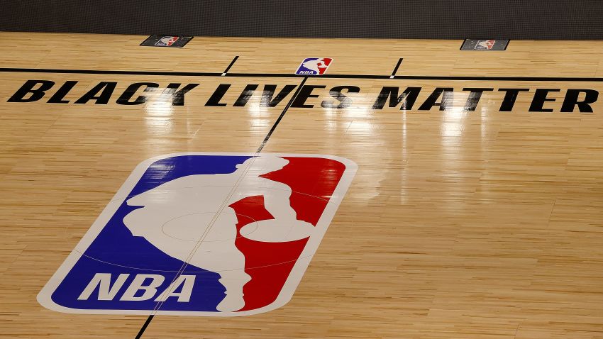 LAKE BUENA VISTA, FLORIDA - AUGUST 27:  The Black Lives Matter logo is seen on an empty court as all NBA playoff games were postponed today during the 2020 NBA Playoffs at AdventHealth Arena at ESPN Wide World Of Sports Complex on August 27, 2020 in Lake Buena Vista, Florida.  NBA players have reportedly decided to resume the season after their walkout of playoff games on Wednesday to protest the shooting of Jacob Blake in Kenosha, Wisconsin.  (Photo by Kevin C. Cox/Getty Images)