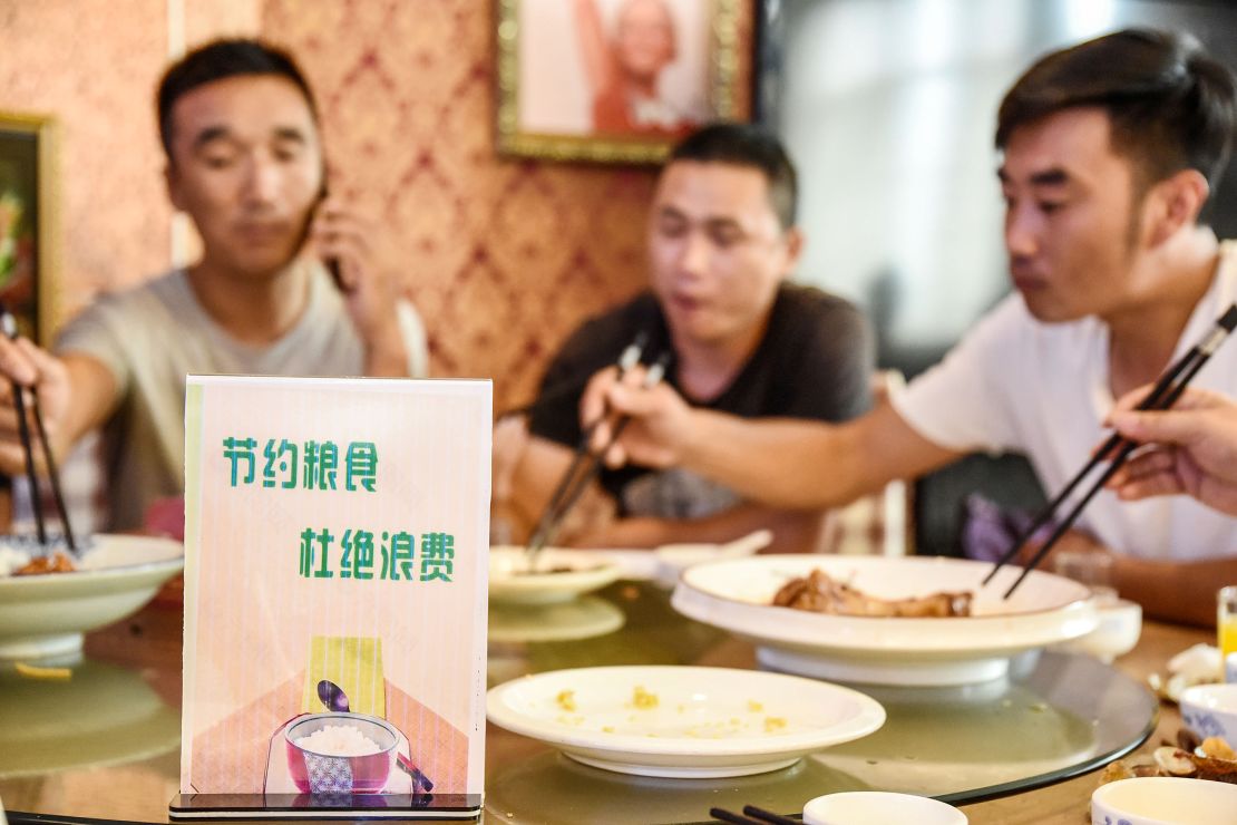 A sign encouraging people not to waste food is seen at a restaurant in Handan in China's northern Hebei province on August 13.