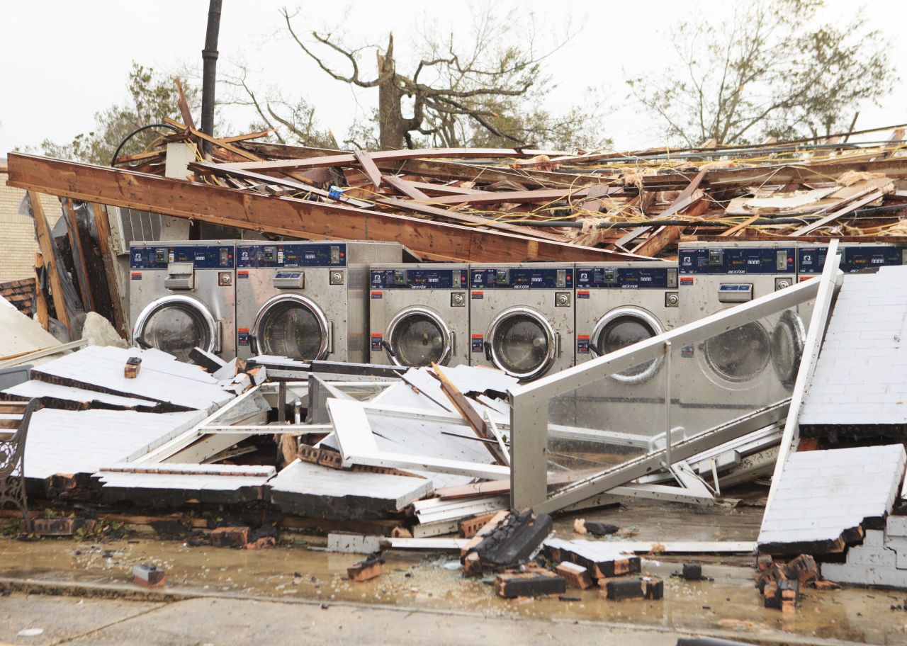 Pousson's Laundromat and Barbershop is left in ruins in Westlake, Louisiana.