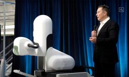 Elon Musk showcases a new working version of the Neuralink brain implant during a livestream on August 28.