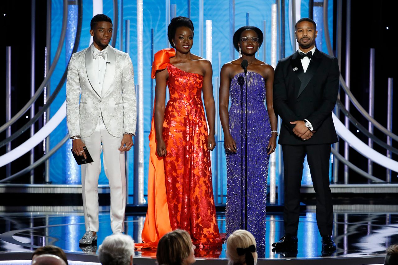 Boseman is joined on stage at the Golden Globes with three of his "Black Panther" co-stars: from left, Danai Gurira, Lupita Nyong'o and Michael B. Jordan.