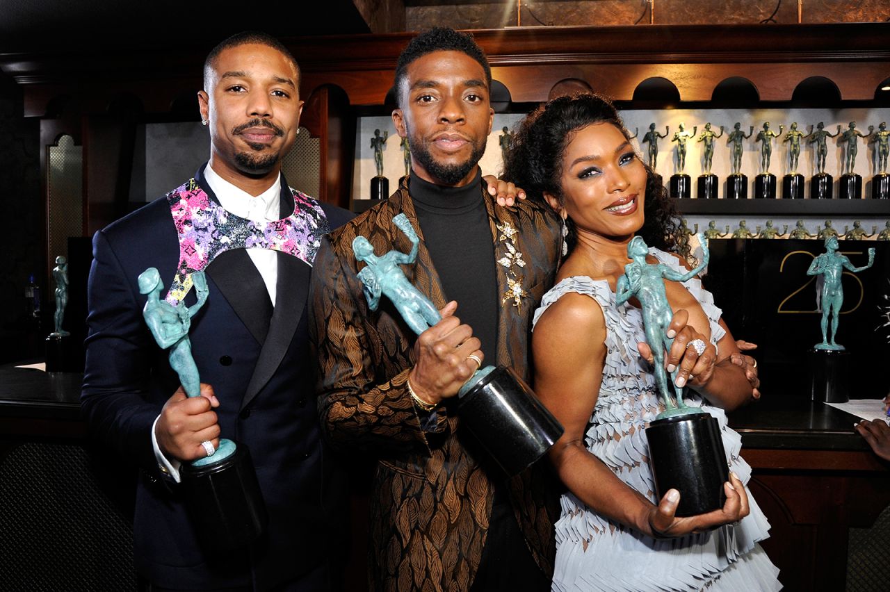 From left, Jordan, Boseman and Angela Bassett attend the Screen Actors Guild Awards in 2019. The "Black Panther" cast won the award for outstanding performance by a cast in a motion picture.