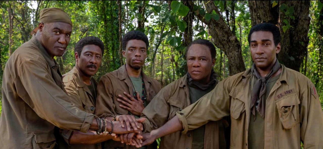 Boseman, center, plays a Vietnam War soldier in "Da 5 Bloods," a Spike Lee film released in June 2020.