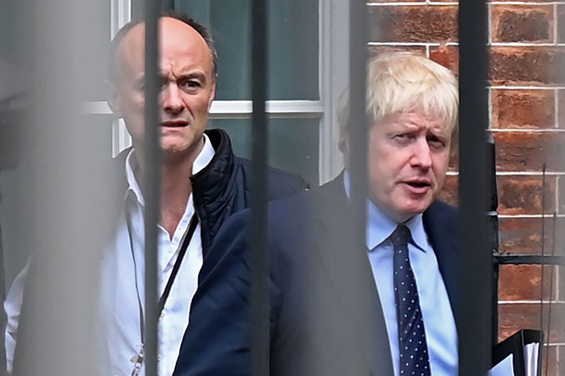 Boris Johnson leaves 10 Downing Street with Dominic Cummings before last year's general election.
