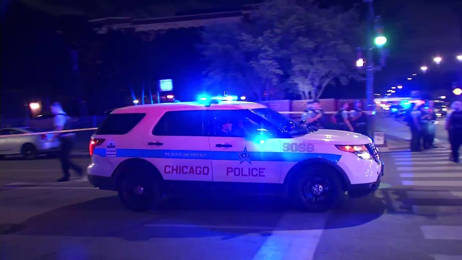 Chicago police respond after reports that two officers were injured by gunfire Sunday.