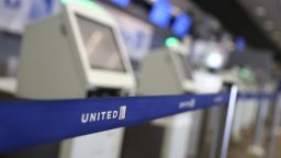 SAN FRANCISCO, CALIFORNIA - JULY 08: A stanchion blocks closed kiosks in the United Airlines terminal at San Francisco International Airport on July 08, 2020 in San Francisco, California. As the coronavirus COVID-19 pandemic continues, United Airlines has sent layoff warnings to 36,000 of its front line employees to give them a 60 day notice that furloughs or pay cuts could occur after October 1. (Photo by Justin Sullivan/Getty Images)