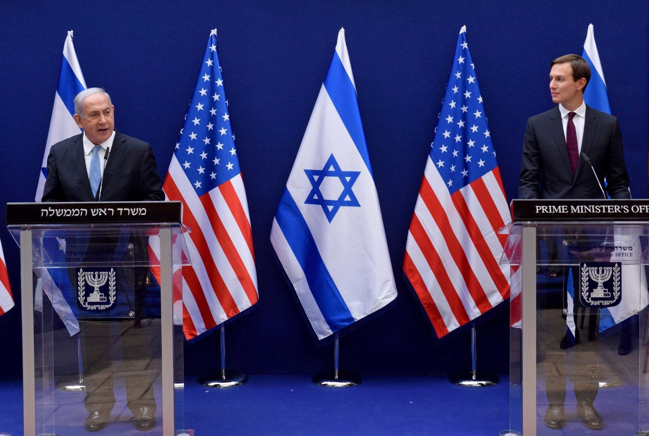 Israeli Prime Minister Benjamin Netanyahu, left, and Kushner make joint statements to the press in Jerusalem on Sunday ahead of Monday's historic flight.