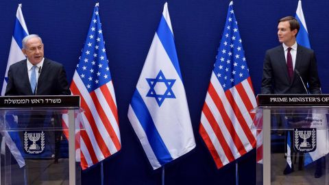 Israeli Prime Minister Benjamin Netanyahu, left, and Kushner make joint statements to the press in Jerusalem on Sunday ahead of Monday's historic flight.