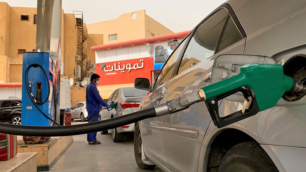 A gas station attendant refills a car at a station in the Saudi capital of Riyadh on May 11. 