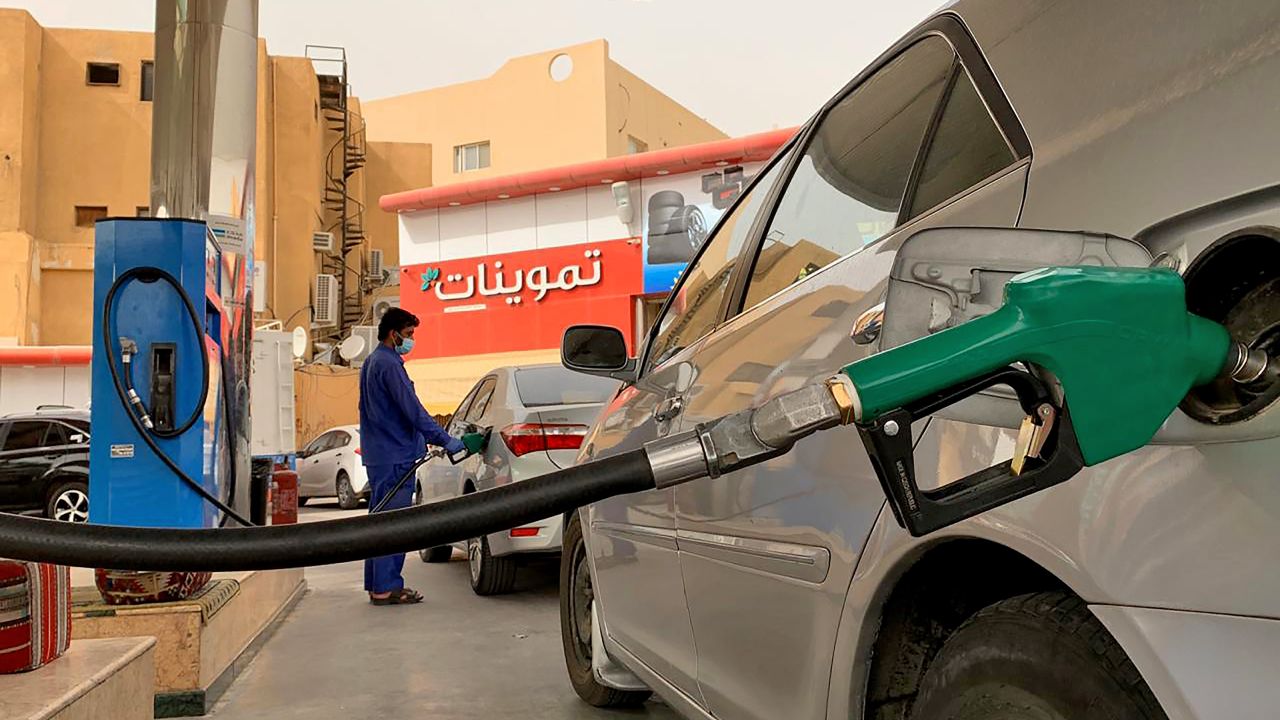 A gas station attendant refills a car at a station in the Saudi capital of Riyadh on May 11.