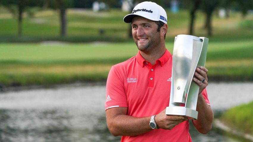 OLYMPIA FIELDS, ILLINOIS - AUGUST 30: Jon Rahm of Spain celebrates with the BMW trophy after winning on the first sudden-death playoff hole against Dustin Johnson (not pictured) during the final round of the BMW Championship on the North Course at Olympia Fields Country Club on August 30, 2020 in Olympia Fields, Illinois. (Photo by Stacy Revere/Getty Images)