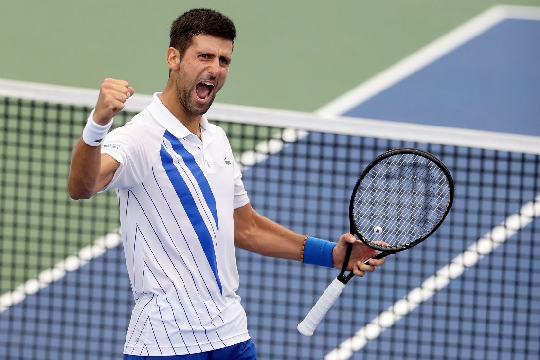 Djokovic celebrates defeating Milos Raonic in the final of the Western & Southern Open.