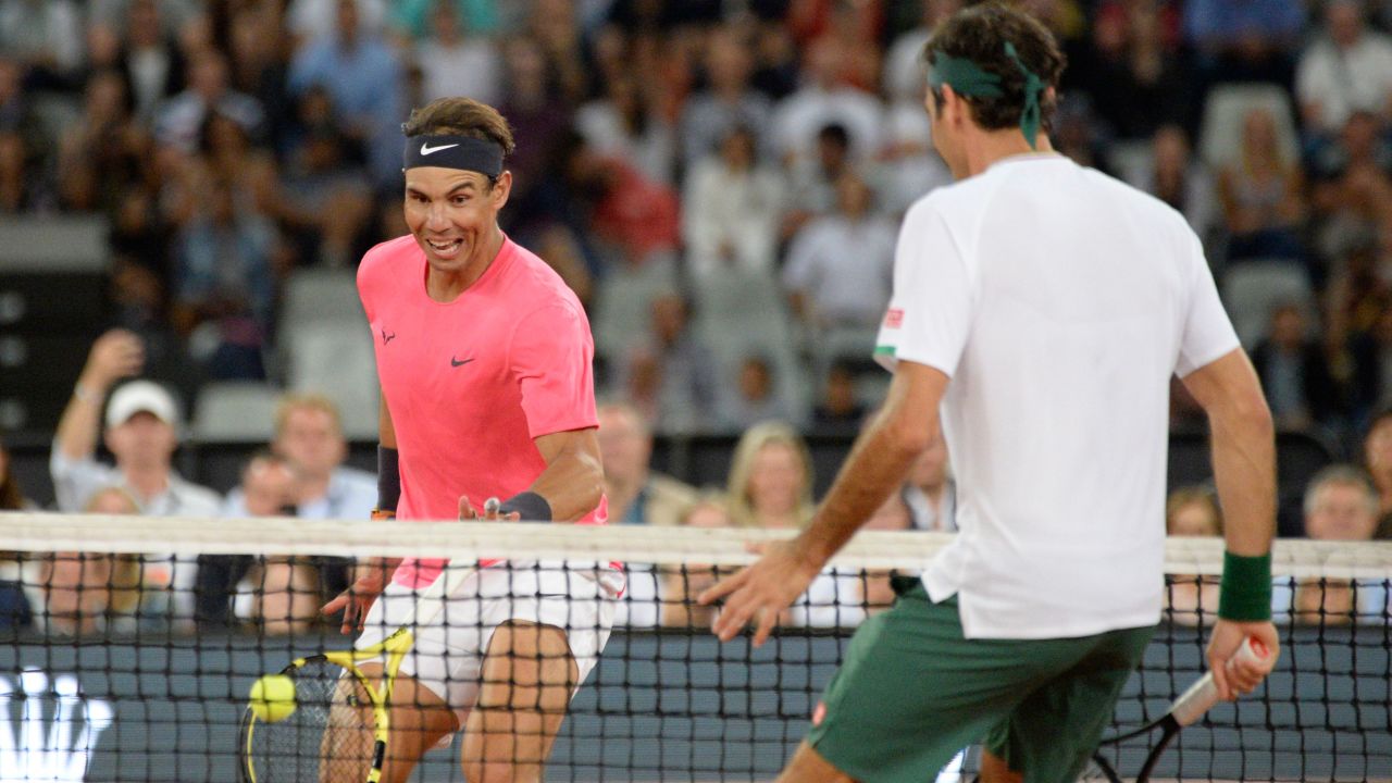 Nadal (left) and Federer will not compete at this year's US Open.