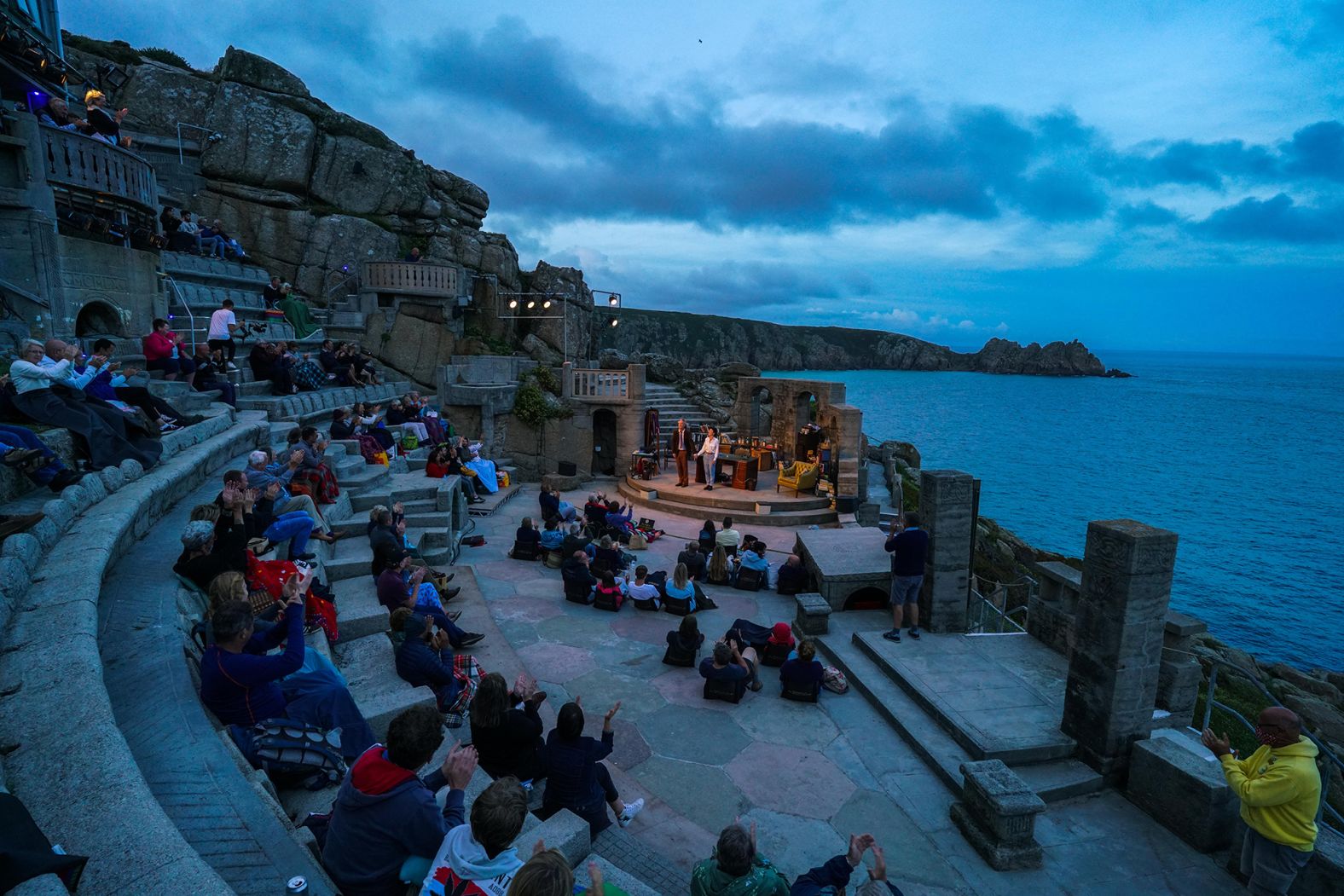 Actors Jessica Johnson and Stephen Tompkinson perform at the Minack Theatre in Porthcurno, England, during a production of Willy Russell's "Educating Rita" on August 18.