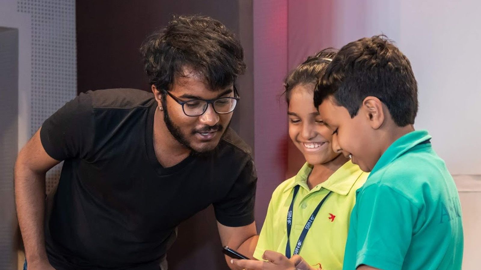 Bhanu does the math with two aspiring aspiring young mathematicians.