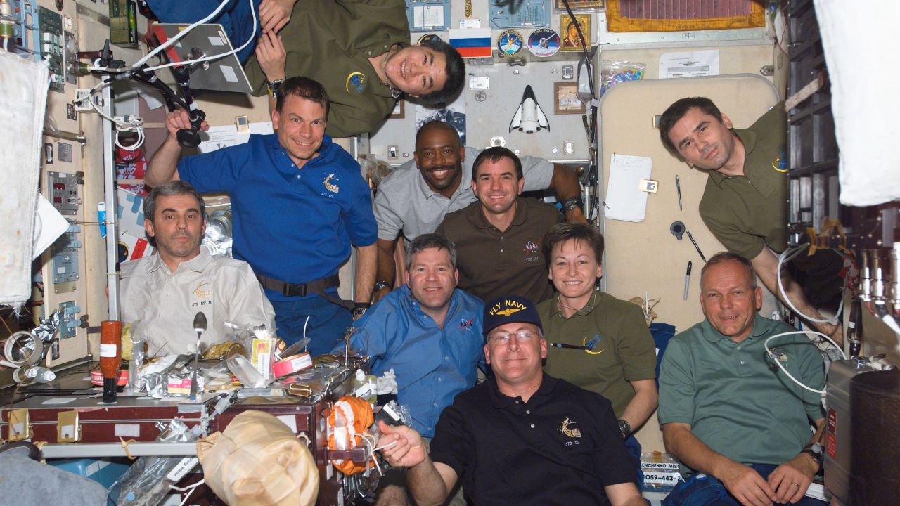 Melvin was with nine other crew members on the space station in February 2008. On the left side of the frame, from top to bottom, are astronauts Daniel Tani, Stanley Love and the European Space Agency's Leopold Eyharts. In the center, from the top, are astronauts Leland Melvin, Rex Walheim, Steve Frick, Peggy Whitson and Alan Poindexter. Cosmonaut Yuri Malenchenko of Russia's Federal Space Agency is top right and below him is ESA astronaut Hans Schlegel.