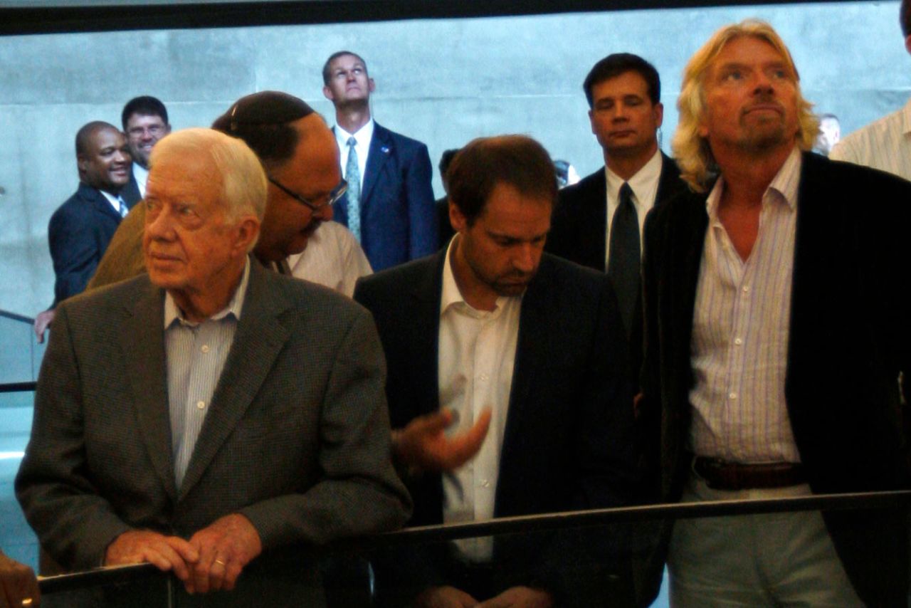 Former President Jimmy Carter and entrepreneur Richard Branson visit the Hall of Names at the Yad Vashem Holocaust History Museum in Jerusalem on August 25, 2009.