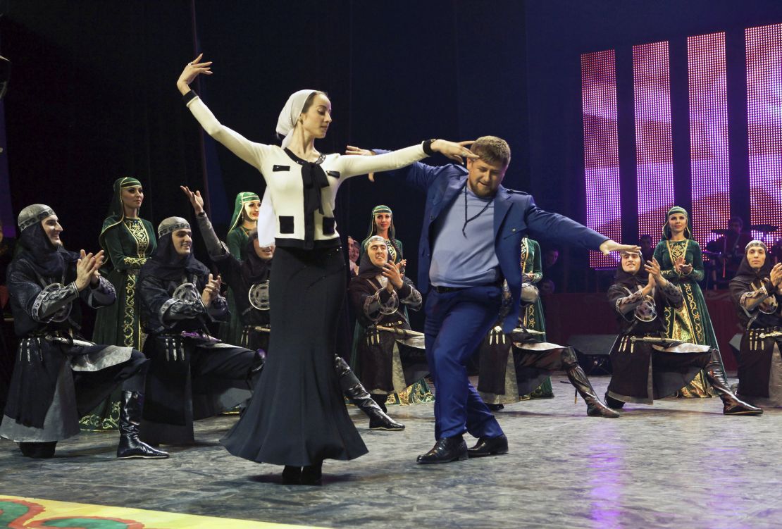 Chechen President Ramzan Kadyrov (fourth from right) dances during a performance of Chechen folkloric music in 2009.