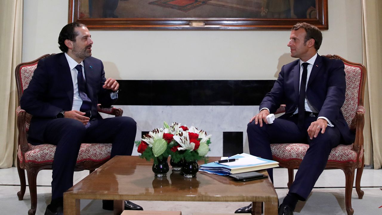 French President Emmanuel Macron meets former Lebanese Prime Minister Saad Hariri (L) at the Pine Residence, the official residence of the French ambassador to Lebanon, in Beirut, on August 31, 2020.