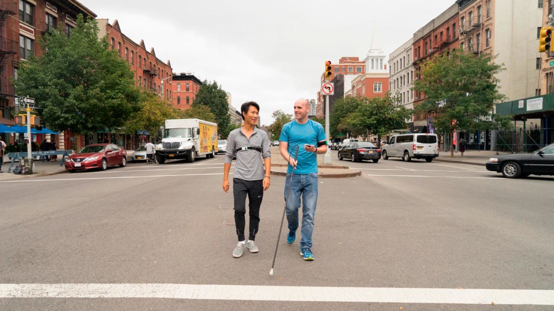 WearWorks co-founder Kevin Yoo (left) and Simon Wheatcroft (right) test out the Wayband.