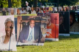 Some of the nearly 900 large poster-sized photos of Detroit victims of COVID-19.