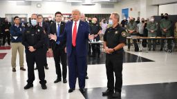 US President Donald Trump speaks with officials on September 1, 2020, at Mary D. Bradford High School in Kenosha, Wisconsin. 