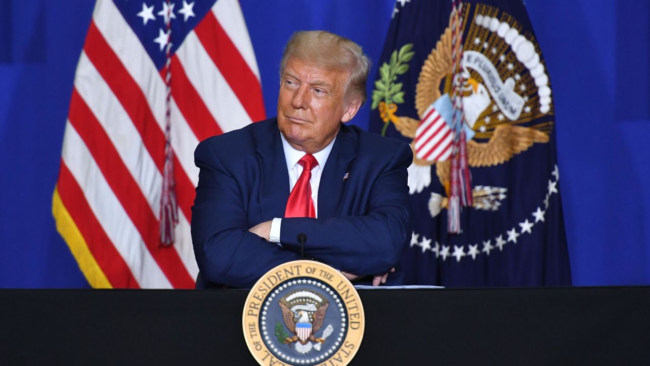 US President Donald Trump listens to officials during a roundtable discussion on community safety, at Mary D. Bradford High School in in Kenosha, Wisconsin on September 1, 2020.